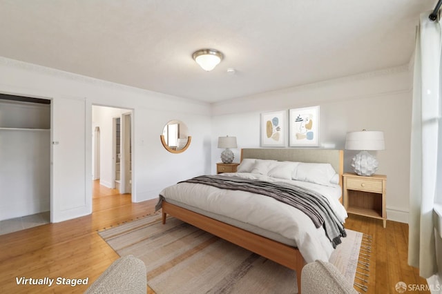 1527 Palou Ave, San Francisco, CA 94124 - bedroom with wood finished floors and a closet