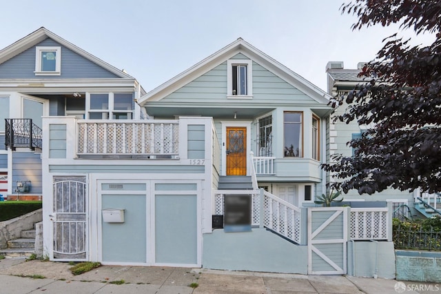 1527 Palou Ave, San Francisco, CA 94124 - view of front of home with a balcony and stairway