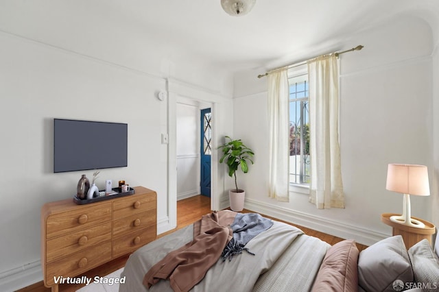 1527 Palou Ave, San Francisco, CA 94124 - bedroom with wood finished floors and baseboards