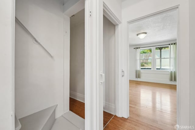 1527 Palou Ave, San Francisco, CA 94124 - hallway featuring wood finished floors and baseboards