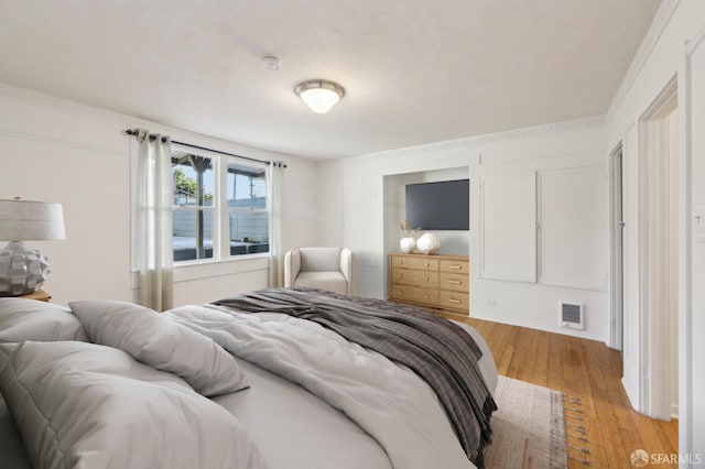 1527 Palou Ave, San Francisco, CA 94124 - bedroom with light wood finished floors