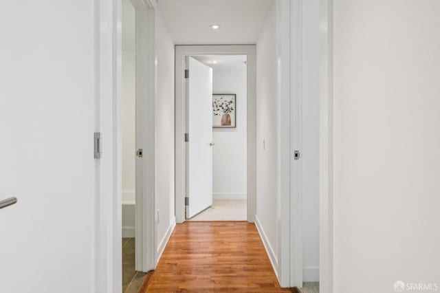 301 Mission St Unit 6J, San Francisco, CA 94105 - hallway featuring wood finished floors and recessed lighting