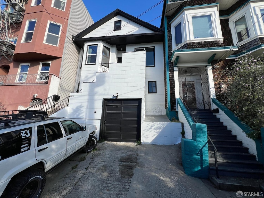 view of front of home with a garage