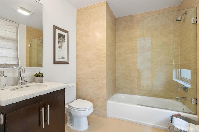 bathroom featuring shower / tub combination, vanity, toilet, and tile patterned floors