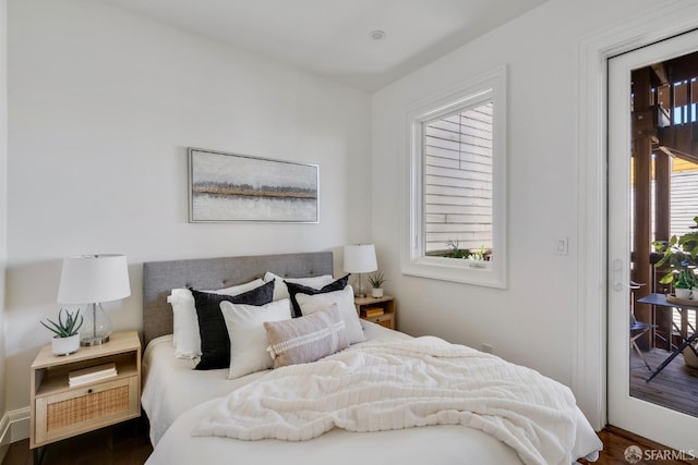 2486 Fulton St, San Francisco, CA 94118 - bedroom featuring wood finished floors and access to outside