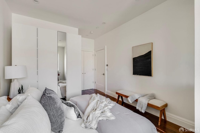 2486 Fulton St, San Francisco, CA 94118 - bedroom with baseboards, wood finished floors, recessed lighting, and a closet