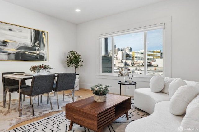 31 Romolo Pl Unit 6, San Francisco, CA 94133 - living area with a view of city, recessed lighting, wood finished floors, and baseboards
