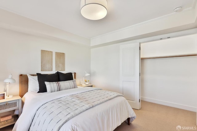 bedroom featuring light colored carpet and ornamental molding