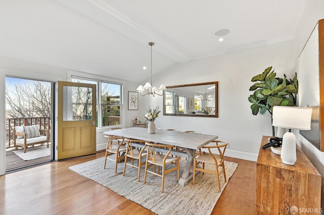 dining space featuring light hardwood / wood-style flooring, vaulted ceiling with beams, and an inviting chandelier