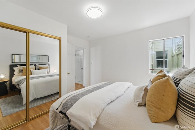 1826 Moraga St, San Francisco, CA 94122 - bedroom featuring wood finished floors and a closet