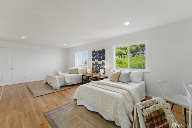 1826 Moraga St, San Francisco, CA 94122 - bedroom featuring wood finished floors, recessed lighting, and baseboards