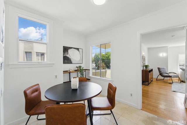 1826 Moraga St, San Francisco, CA 94122 - dining area featuring baseboards, ornamental molding, and light tile patterned flooring