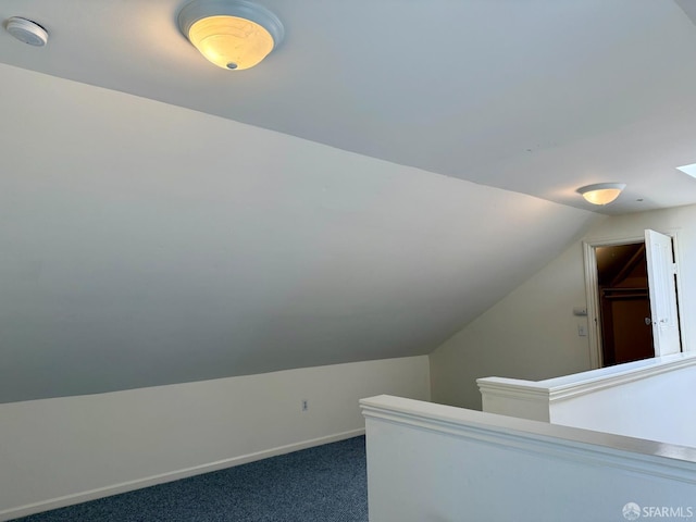 3543-3545 24th St, San Francisco, CA 94110 - staircase featuring lofted ceiling, carpet, and baseboards