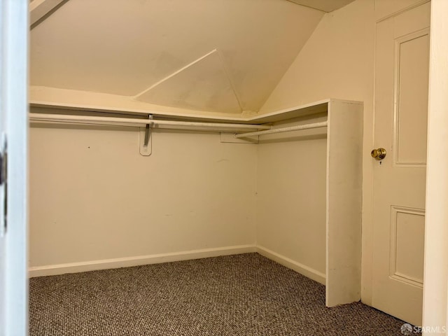 3543-3545 24th St, San Francisco, CA 94110 - spacious closet with carpet and vaulted ceiling