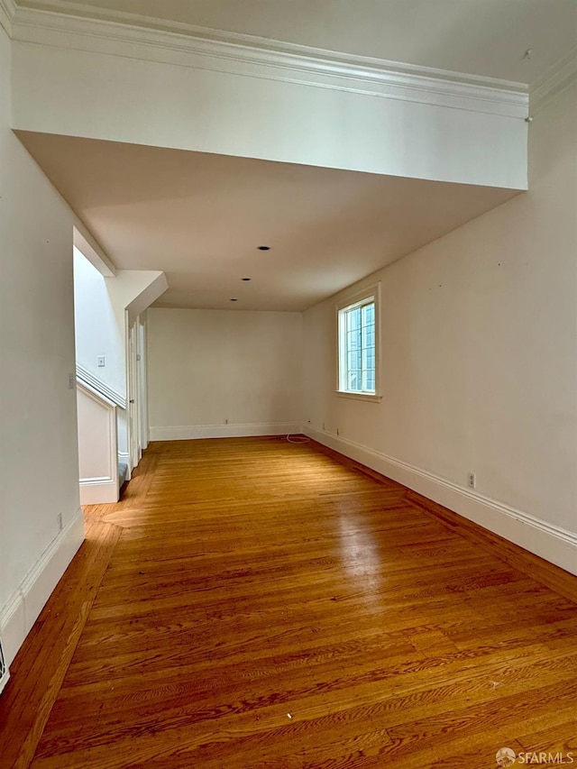 3543-3545 24th St, San Francisco, CA 94110 - unfurnished room featuring ornamental molding, light wood-style floors, and baseboards