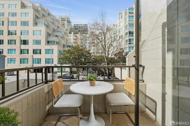 balcony featuring a view of city