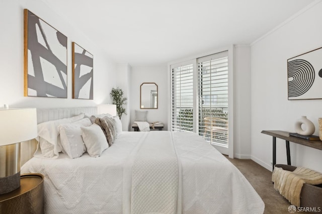 bedroom featuring carpet floors and baseboards