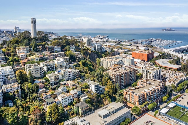 bird's eye view featuring a water view and a city view