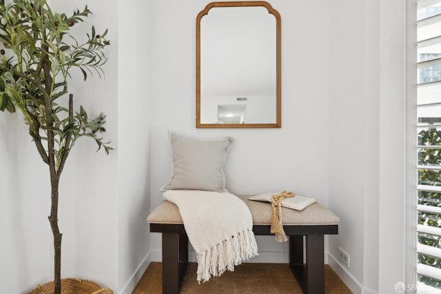 sitting room featuring baseboards