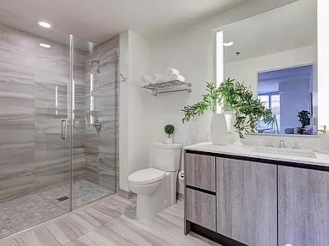333 Beale St Unit 6J, San Francisco, CA 94105 - full bathroom featuring vanity, a shower stall, and recessed lighting