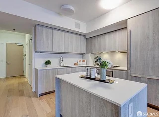 333 Beale St Unit 6J, San Francisco, CA 94105 - kitchen with modern cabinets, light countertops, and light wood-type flooring