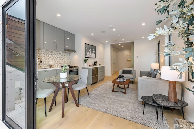 interior space with light wood-style flooring and recessed lighting