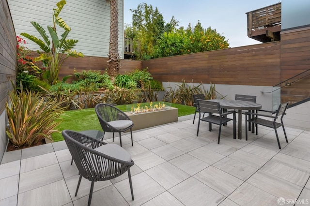 view of patio / terrace featuring a fenced backyard and outdoor dining space