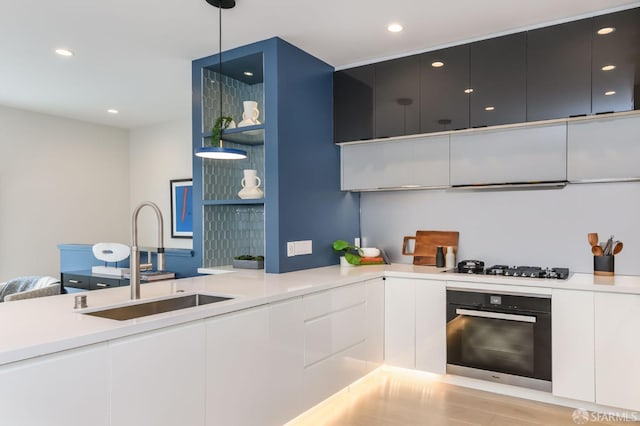 kitchen featuring black oven, open shelves, modern cabinets, and a sink