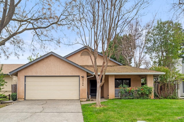 single story home with a garage, driveway, a front yard, a porch, and stucco siding