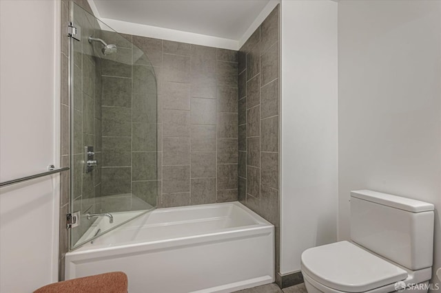 bathroom with toilet and shower / tub combination