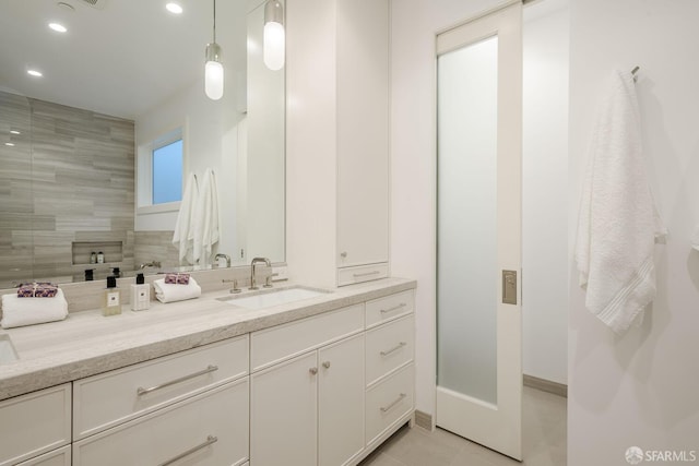 3537 23rd St Unit A, San Francisco, CA 94110 - bathroom featuring recessed lighting, baseboards, tile patterned floors, and vanity