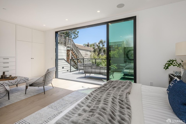 3537 23rd St Unit A, San Francisco, CA 94110 - bedroom with recessed lighting, wood finished floors, and access to outside
