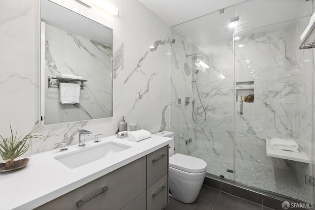 bathroom featuring decorative backsplash, vanity, walk in shower, toilet, and tile patterned floors