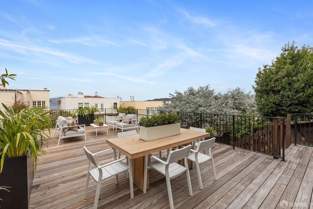 deck with an outdoor hangout area