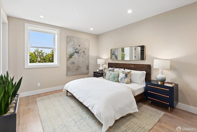 bedroom featuring light wood-type flooring