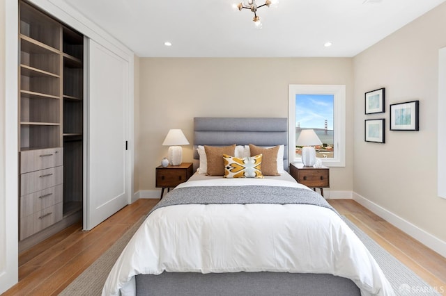 bedroom with light hardwood / wood-style floors