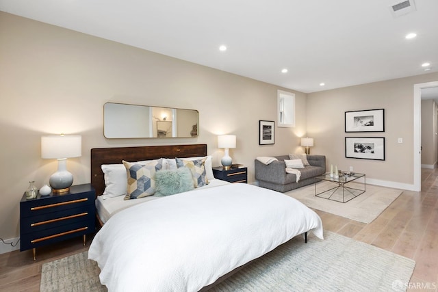 bedroom with light wood-type flooring