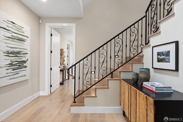 stairway with wood-type flooring