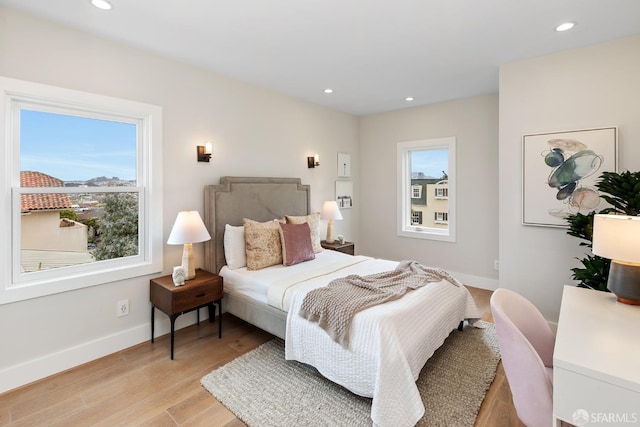 bedroom featuring light hardwood / wood-style floors