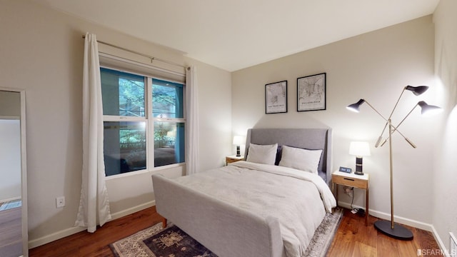 bedroom featuring hardwood / wood-style flooring