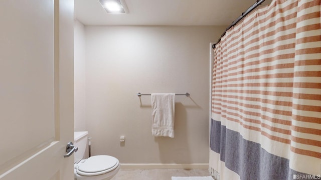 bathroom with vanity, toilet, and tile patterned floors