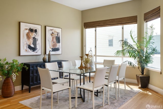 3310 19th St Unit 303, San Francisco, CA 94110 - dining room with plenty of natural light, light wood-style flooring, and baseboards