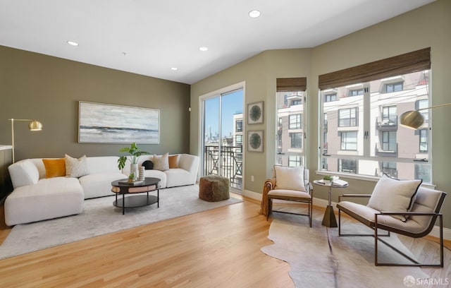3310 19th St Unit 303, San Francisco, CA 94110 - living room with wood finished floors, recessed lighting, and baseboards