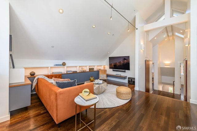 living room with dark wood-type flooring and high vaulted ceiling