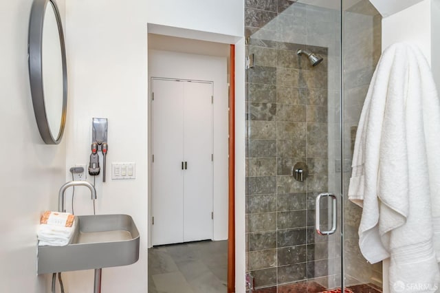 bathroom featuring an enclosed shower