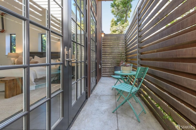 balcony featuring french doors