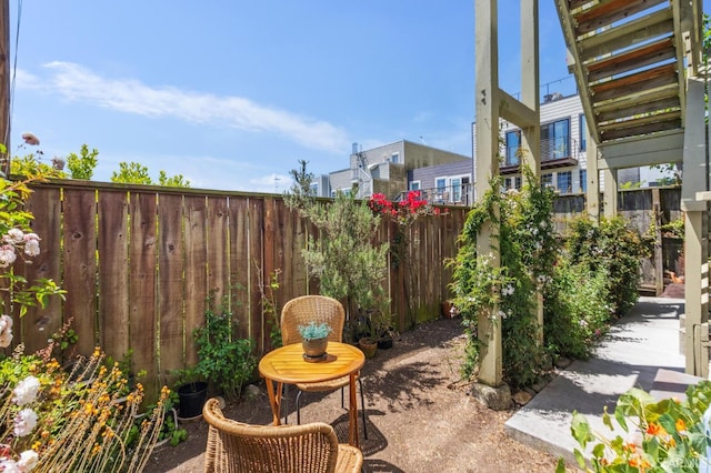 2065-2067 Turk Blvd, San Francisco, CA 94115 - fenced backyard featuring a patio area