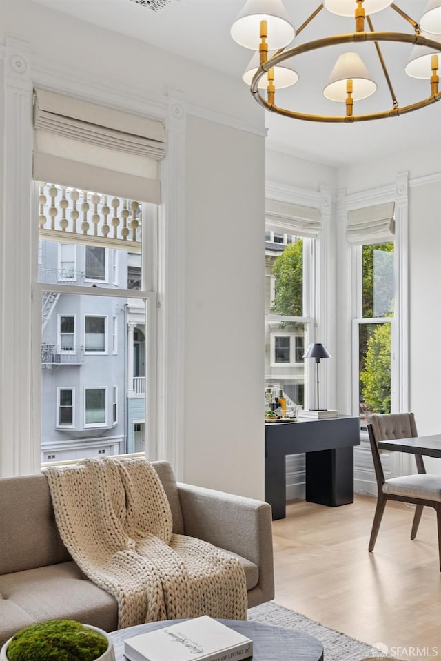 2531 Gough St, San Francisco, CA 94123 - living room featuring light wood-type flooring and a chandelier