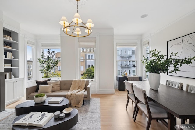 2531 Gough St, San Francisco, CA 94123 - living area featuring a chandelier, light wood-style floors, and built in features