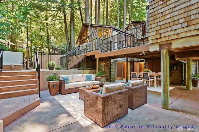 view of patio featuring an outdoor living space and a deck